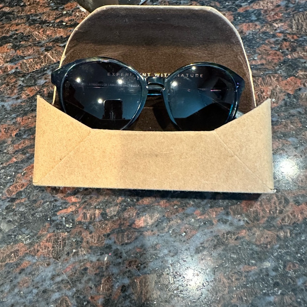 Experiment With Nature Sunglasses with Case. Never been worn.
